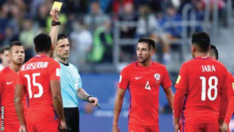 Referee Milorad Mazic decided to only book Chile's Gonzalo Jara after the player appeared to elbow Germany's Timo Werner during the Confederations Cup final Referee Milorad Mazic decided to only book Chile's Gonzalo Jara after the player appeared to elbow Germany's Timo Werner during the Confederations Cup final
