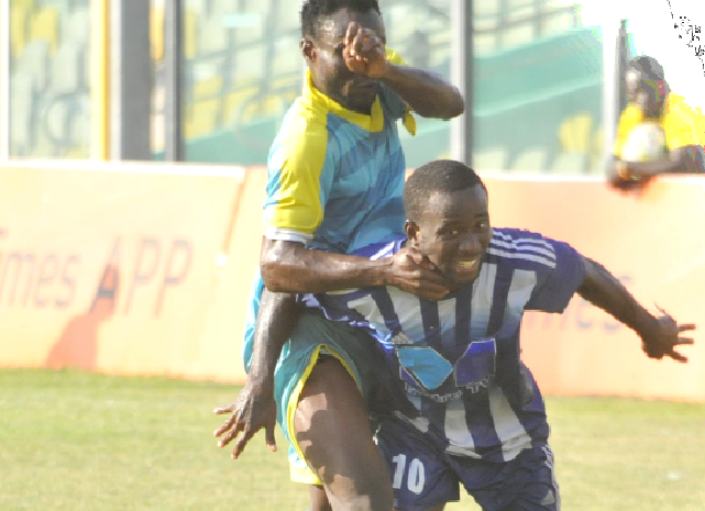 Olympics’ Coffie Bekoe is being retrained by his All Stars marker during the game. Picture EBOW HANSON Olympics’ Coffie Bekoe is being retrained by his All Stars marker during the game. Picture EBOW HANSON