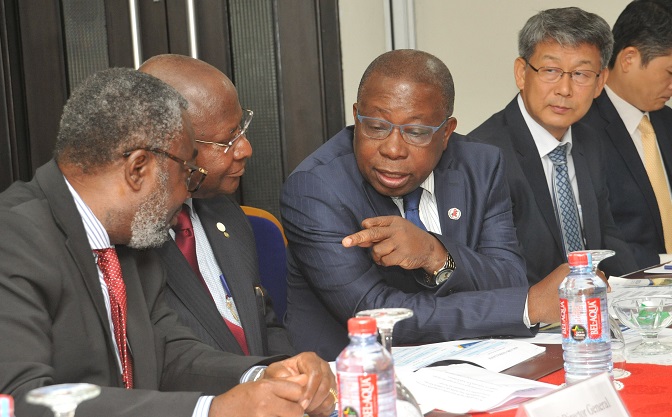 Mr Agyemang-Manu interacting with Dr Anthony Nsiah-Asare and Dr Frank Nyonator during the launching ceremony. With them is Ambassador Sung Soo Kim of the Republic of Korea (right)