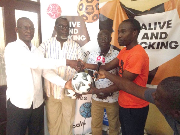 • Mr Wilson Kwabena Duffour (right) presenting the balls to the vice-chairman of GARFA, Mr Gabriel Godwin Quao • Mr Wilson Kwabena Duffour (right) presenting the balls to the vice-chairman of GARFA, Mr Gabriel Godwin Quao