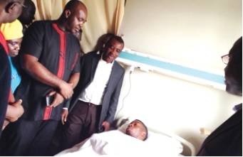 Mr Asiamah (2nd left) at the bedside of Ashitey Ollenu during his visit to KATH Mr Asiamah (2nd left) at the bedside of Ashitey Ollenu during his visit to KATH