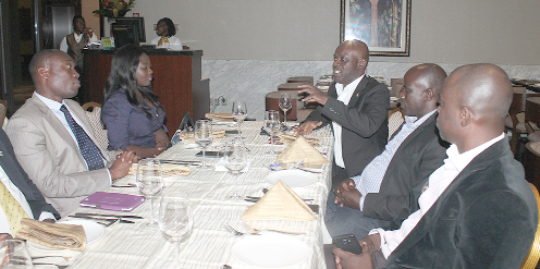 Mr Osei-Owusu (arrowed) in a discussion with some members of the association Mr Osei-Owusu (arrowed) in a discussion with some members of the association