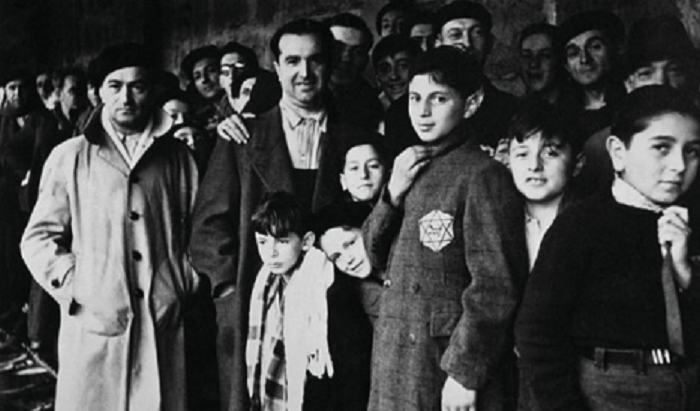• This photo taken in 1942 shows Jewish deportees in the Drancy transit camp before being sent to Auschwitz • This photo taken in 1942 shows Jewish deportees in the Drancy transit camp before being sent to Auschwitz