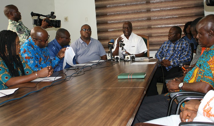 Dr Felix Anyah (middle), C.E.O of Korle Bu Teaching Hospital, addressing the team from Stanbic Bank