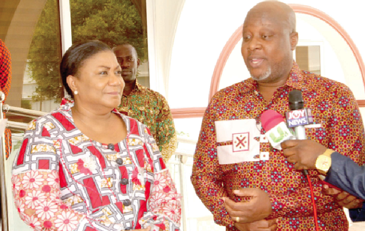 Mr Kwame Sefa Kayi (right) addressing the First Lady Mr Kwame Sefa Kayi (right) addressing the First Lady