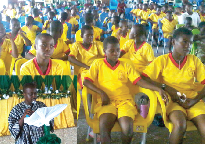 Mr Barima Akwasi Amankwaah (INSET), National Coordinator of the GNCRC, addressing participants  including schoolchildren, at the 20th anniversary celebration of the GNCRC in Bolgatanga.