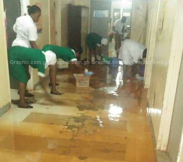 Some nurses at the Tamale Teaching Hospital cleaning the mess created by the flood waters One person confirmed dead in Tamale floods