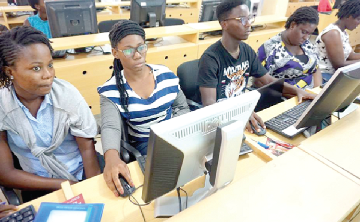 Some trainees at the I.T. training session