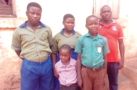 Mr Otu(right), the widower, with his four children. Below: The deceased, Cynthia Nuwersu Mr Otu(right), the widower, with his four children. Below: The deceased, Cynthia Nuwersu