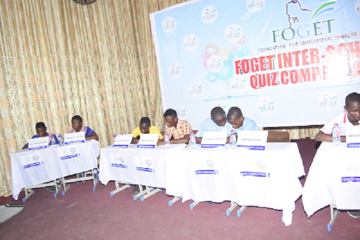 Contestants listening attentively to questions Contestants listening attentively to questions
