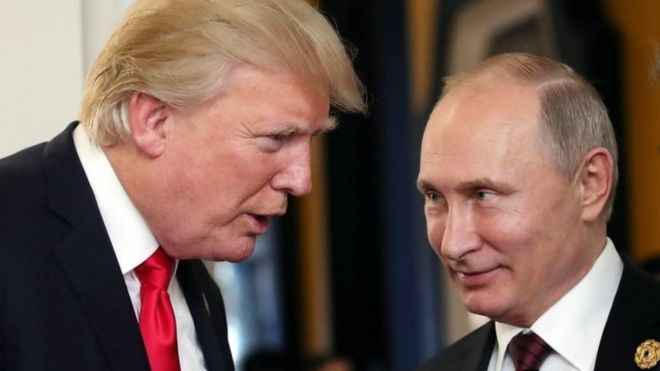  Vladimir Putin (L) and Donald Trump had kept the world guessing about whether they would formally meet in Vietnam 