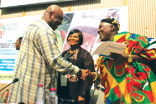 Mr Carlos Ahenkorah (left) exchanging pleasantries with Nana Gyamera, Kukuom Union President, and other participants Mr Carlos Ahenkorah (left) exchanging pleasantries with Nana Gyamera, Kukuom Union President, and other participants
