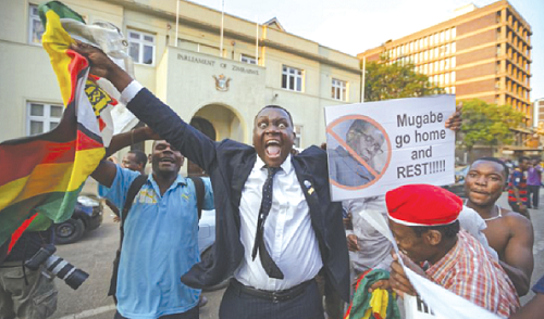 Zimbabweans jubilating after hearing the announcement of Robert Mugabe’s resignation Zimbabweans jubilating after hearing the announcement of Robert Mugabe’s resignation