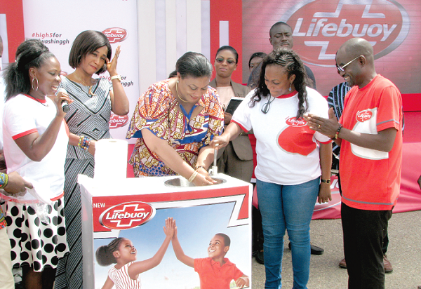 First Lady Mrs Rebecca Akufo -Addo (middle) washing her hands at the event. With her are Ms Otiko Afisah Djaba (2nd right), the Minister for Gender, Children and Social Protection, and other officials. Pictures: ESTHER ADJEI First Lady Mrs Rebecca Akufo -Addo (middle) washing her hands at the event. With her are Ms Otiko Afisah Djaba (2nd right), the Minister for Gender, Children and Social Protection, and other officials. Pictures: ESTHER ADJEI