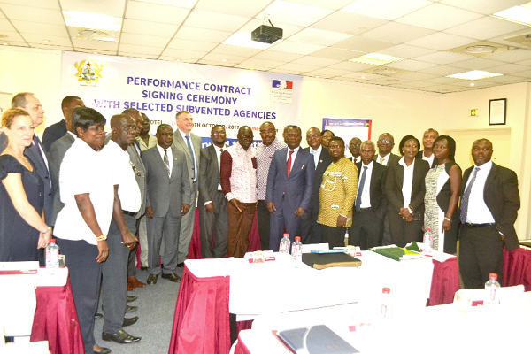  Mr Stephen Asamoah Boateng, (right arrow) with Mr Francois Pujolas (left arrow) and other participants