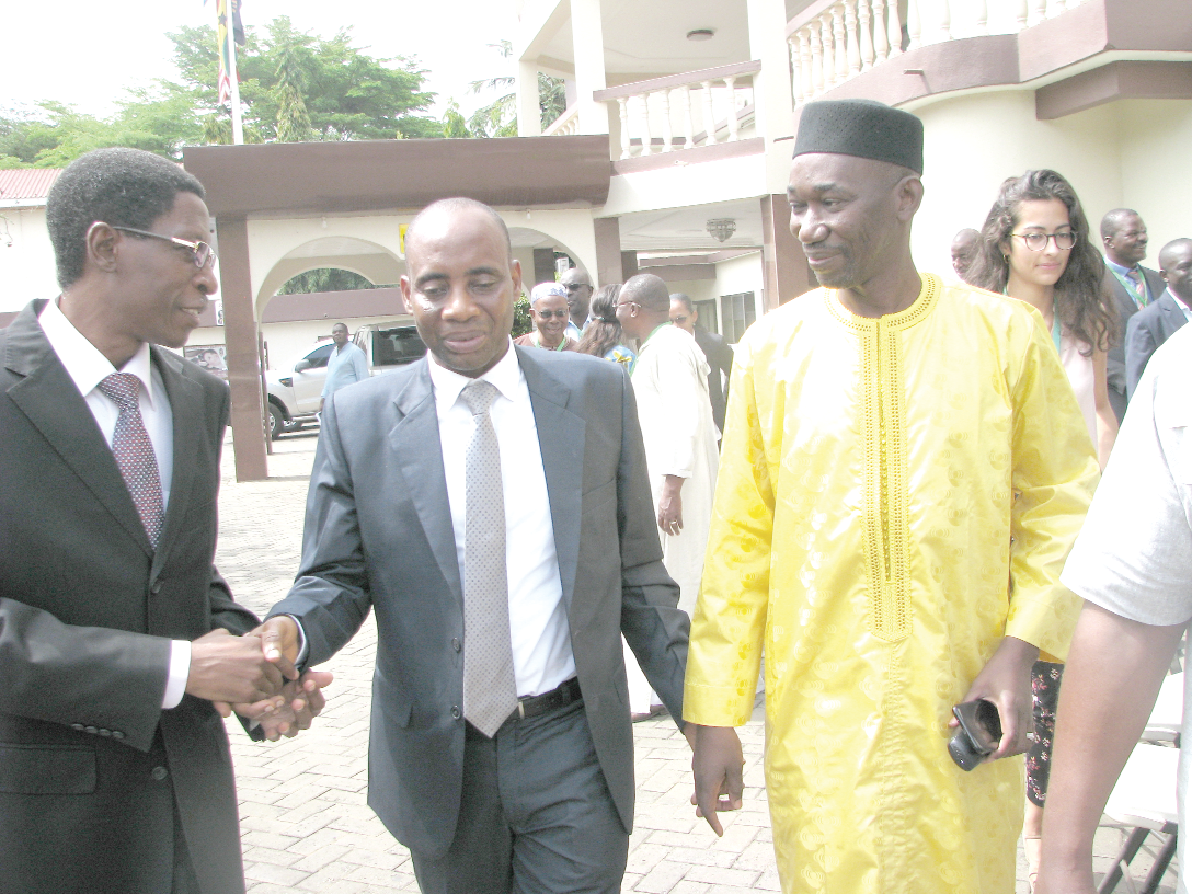 Mr Sagre Bambangi (middle), a Deputy Minister of Food and Agriculture, chatting with Mr Ousseini Salifou ( left), Executive Director of the ECOWAS Regional Agency for Agriculture and Food (FAAF). Looking on is Mr Youssouf Maiga (3rd right), Chairman and Chief Executive Officer of the Office of the Food Security Commissioner after the meeting Mr Sagre Bambangi (middle), a Deputy Minister of Food and Agriculture, chatting with Mr Ousseini Salifou ( left), Executive Director of the ECOWAS Regional Agency for Agriculture and Food (FAAF). Looking on is Mr Youssouf Maiga (3rd right), Chairman and Chief Executive Officer of the Office of the Food Security Commissioner after the meeting