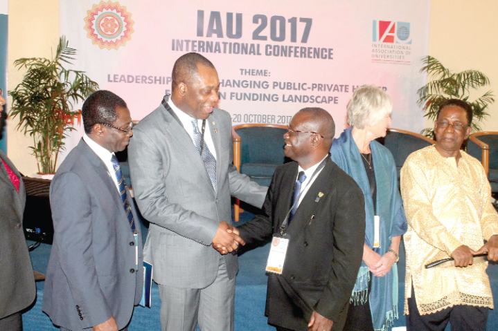 Dr Matthew Opoku Prempeh (2nd left), the Minister of Education, exchanging pleasantries with Prof Ebenezer Oduro Owusu (3rd left), Vice-Chancellor, UG. Looking on are Prof. S. Kwame Offei (left), the Pro-Vice Chancellor, Academic and Students Affairs, University of Ghana; Prof. Pam Fredman (2nd right), the President of the International Association of Universities (IAU), and Prof Kwesi Yankah (right). Dr Matthew Opoku Prempeh (2nd left), the Minister of Education, exchanging pleasantries with Prof Ebenezer Oduro Owusu (3rd left), Vice-Chancellor, UG. Looking on are Prof. S. Kwame Offei (left), the Pro-Vice Chancellor, Academic and Students Affairs, University of Ghana; Prof. Pam Fredman (2nd right), the President of the International Association of Universities (IAU), and Prof Kwesi Yankah (right).