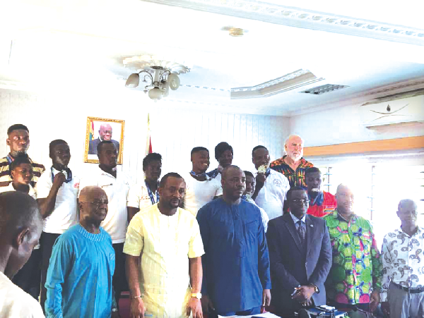 Sports Minister rewards four weightlifters