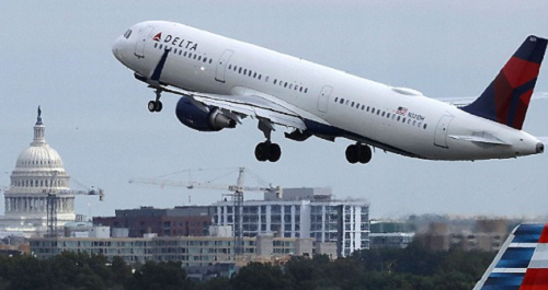 Woman, 48, is 'caught giving man, 28, oral sex on Delta flight