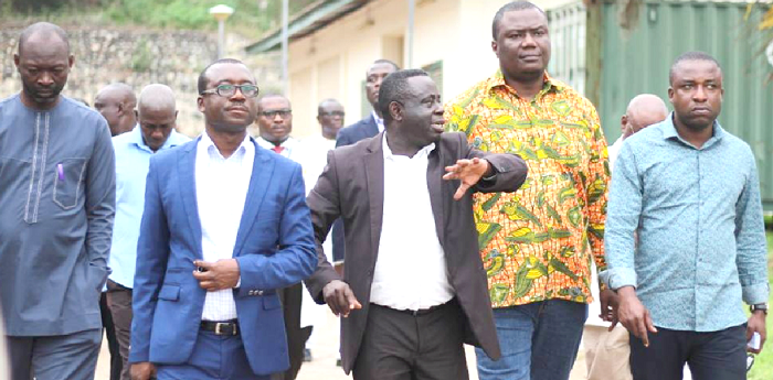 Dr Asare (middle) leading the Parliamentary select Committee on health round the hospital