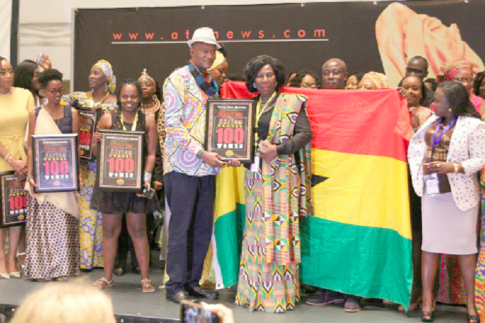 Ms Nancy Sam Quartey, the President of the Tour Operators Union of Ghana (TOUGHA), receiving her award from Mr Ikechi Uko Ms Nancy Sam Quartey, the President of the Tour Operators Union of Ghana (TOUGHA), receiving her award from Mr Ikechi Uko