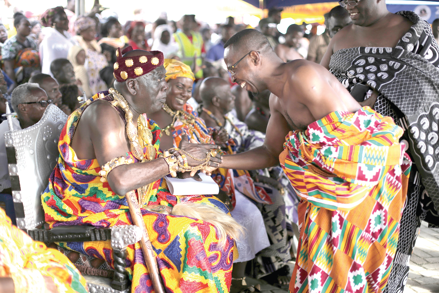 Osabarima Kwesi Atta II, Omanhen of Oguaa Traditional Area, welcoming Mr Kwamena Duncan, the Central Regional Minister to the durbar grounds