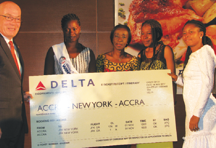 Ms Josephine Ngmenba-Engaa (2nd left)  receiving her award  from Mr Robert Jackson (left). With them includes  Ms Delese Mimi Darko( middle), CEO, Foods and Drugs Authority. Picture: ESTHER ADJEI