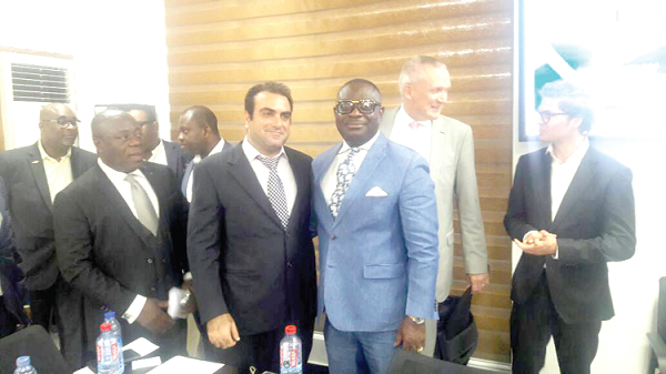 Mr Anthony Opoku (3rd right) with his business partners after the press briefing in Accra yesterday Mr Anthony Opoku (3rd right) with his business partners after the press briefing in Accra yesterday