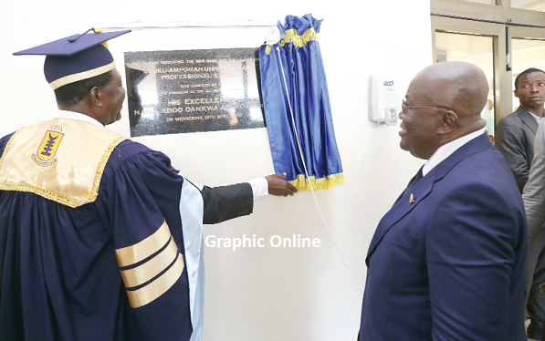 President Akufo-Addo (right) reading the inscription on the plaque after unveiling it. Picture: SAMUEL TEI ADANO President Akufo-Addo (right) reading the inscription on the plaque after unveiling it. Picture: SAMUEL TEI ADANO