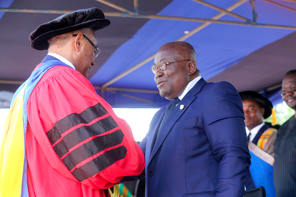 President Akufo-Addo congratulating Mr Ahmad Ahmad (left), President of the Confederation of African Football (CAF) at the UPSA in Accra. President Akufo-Addo congratulating Mr Ahmad Ahmad (left), President of the Confederation of African Football (CAF) at the UPSA in Accra.