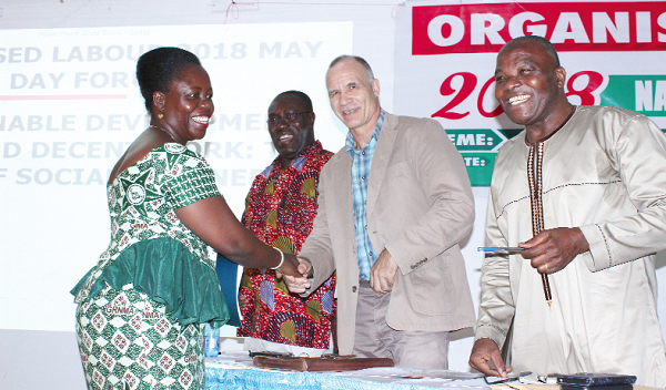 Mr Fritz Kopsieker (2nd right) interacting with Ms Perpetual Ofori-Ampofo (left), Member, National May Day Planning Committee. Looking on is Mr John Amegashie (right), Chairman, National May Day Planning Committee, and Dr Yaw Baah. Picture: INNOCENT K. OWUSU Mr Fritz Kopsieker (2nd right) interacting with Ms Perpetual Ofori-Ampofo (left), Member, National May Day Planning Committee. Looking on is Mr John Amegashie (right), Chairman, National May Day Planning Committee, and Dr Yaw Baah. Picture: INNOCENT K. OWUSU