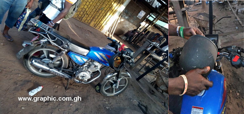The policeman's abandoned motorbike and helmet 