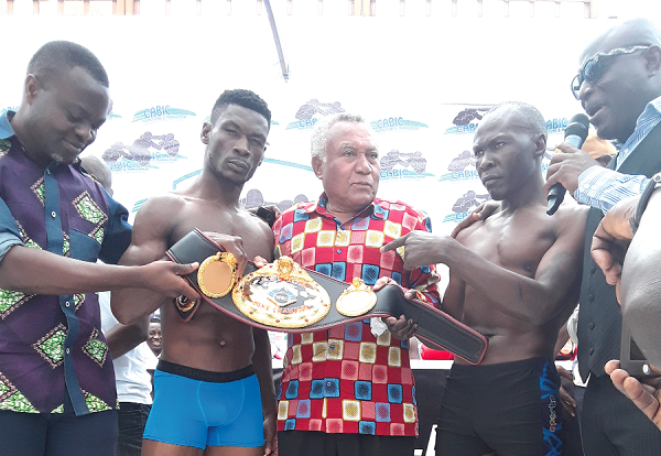 Samir Captan sandwiched by Patrick Allotey (left) and Badru Lusambya (right) Samir Captan sandwiched by Patrick Allotey (left) and Badru Lusambya (right)