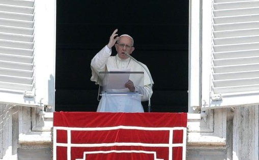 Pope Francis delivers a blessing during the Angelus noon prayer in St. Peter's Square at the Vatican on Aug. 19, 2018. Pope Francis delivers a blessing during the Angelus noon prayer in St. Peter's Square at the Vatican on Aug. 19, 2018.