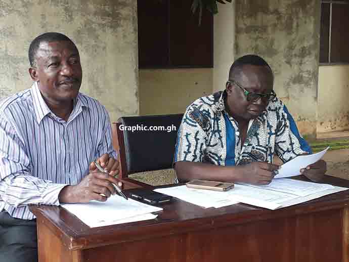 Mr Frank Nunoo (left) addressing journalists. With him is Mr Charles Damoah also at the EC Office in Brong Ahafo