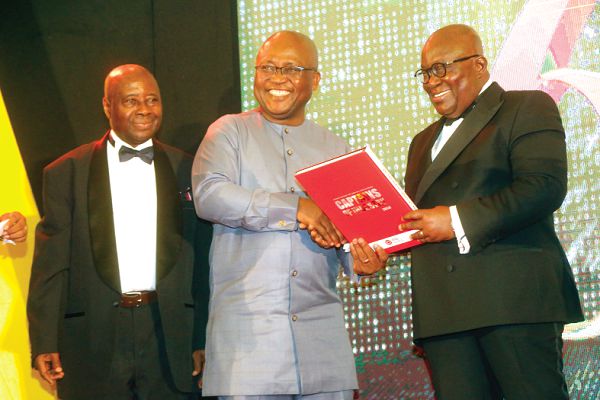 Dr Yaw Adu Gyamfi (left) presenting a commemorative book on AGI@60 to President Akufo-Addo. Picture: SAMUEL TEI ADANO Dr Yaw Adu Gyamfi (left) presenting a commemorative book on AGI@60 to President Akufo-Addo. Picture: SAMUEL TEI ADANO