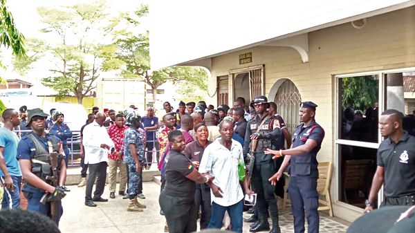 One of the observers being escorted out of the resticted area by the police. Picture: Benedict Obuobi One of the observers being escorted out of the resticted area by the police. Picture: Benedict Obuobi