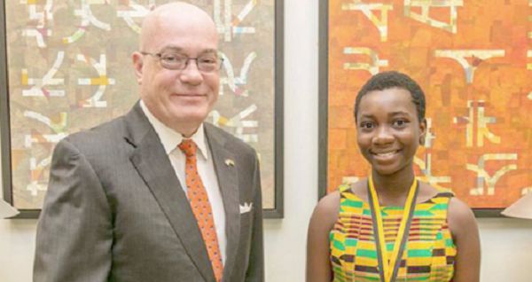 Lily Tugbah poses with the US Ambassador, Mr Robert Jackson. Who would she hand over to? Lily Tugbah poses with the US Ambassador, Mr Robert Jackson. Who would she hand over to?