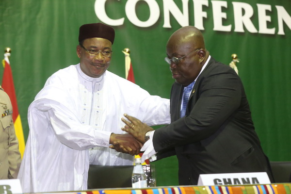 President Akufo-Addo in a hand shake with Mr Mohamadou Issoufou, President of Niger, at the ceremony. President Akufo-Addo in a hand shake with Mr Mohamadou Issoufou, President of Niger, at the ceremony.