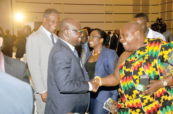 Nana Kwaku Dei I, acting Managing Director of Graphic Communications Group Ltd, exchanging pleasantries with Mr Sam Ato Gaisie, President of Ghana Entrepreneurs Foundation, at the Graphic Business/Stanbic Bank breakfast meeting in Accra. Picture: EBOW HANSON