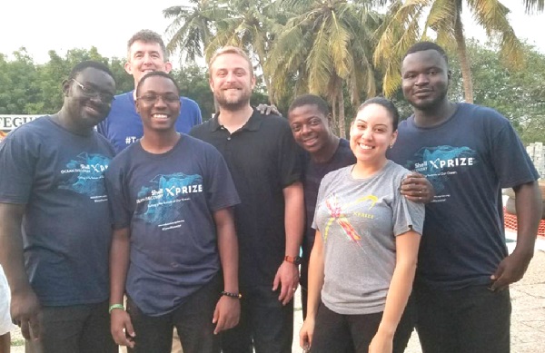 Dr Mark Amo-Boaten (left), team leader of the tech experts, with some members of the team and xprize panel in a group photo