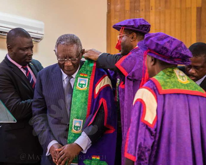 Former President Kufuor being decorated after his investiture Former President Kufuor being decorated after his investiture