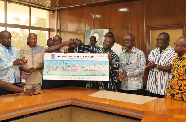 Mr Osei Assibey Antwi (3rd left), presenting a dummy cheque to Prof. Obiri-Danso Mr Osei Assibey Antwi (3rd left), presenting a dummy cheque to Prof. Obiri-Danso