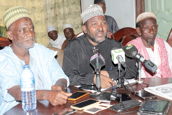 Imam Hanafi Sonde (middle), Alhaji Mohammed Hadu (right), Vice Chairman of GNACF, and Alhaji Abdulkareem Mohammed, an Adviser of GNACF, Eastern Region addressing the press conference.