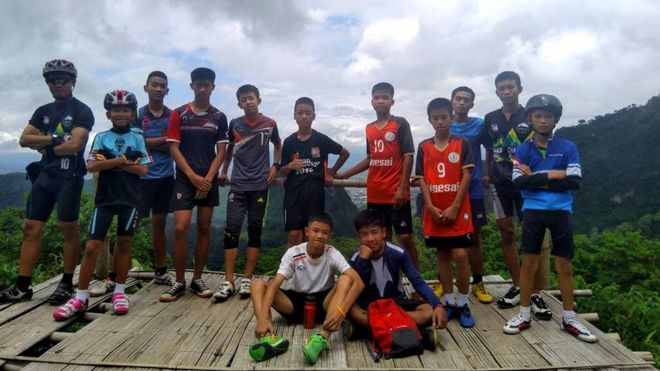 A Facebook photo shows the coach with some of the missing children A Facebook photo shows the coach with some of the missing children