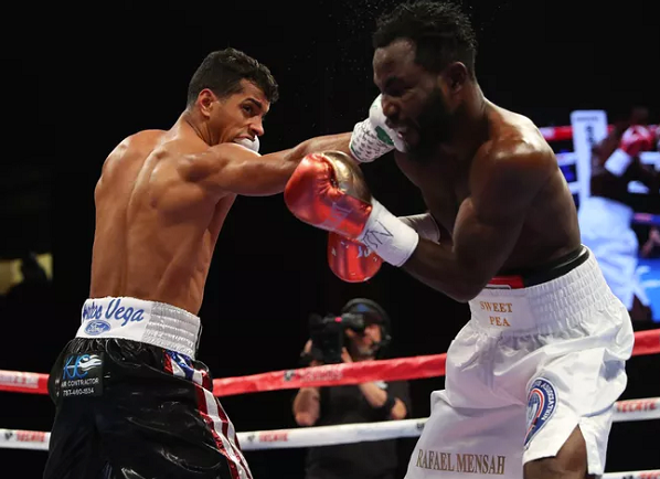 Machado dominates Mensah to retain WBA title Machado dominates Mensah to retain WBA title