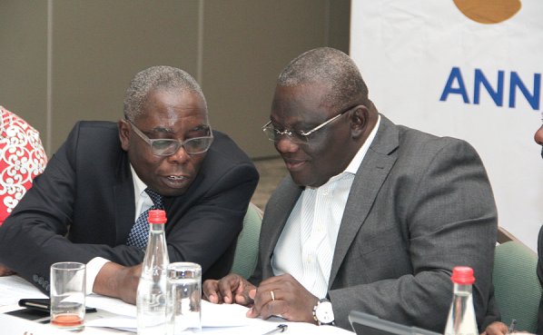 Mr Kofi Yamoah (left), Managing Director, Ghana Stock Exchange explaining a point to Mr Albert Essien, Council Chairman. Picture: BENEDICT OBUOBI  