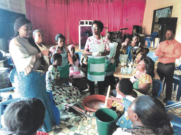 Mrs Justina Marigold Assan (left) addressing the participants during the training. Looking on is Madam Monica Esi Crentsil (standing middle), facilitator for the training Mrs Justina Marigold Assan (left) addressing the participants during the training. Looking on is Madam Monica Esi Crentsil (standing middle), facilitator for the training