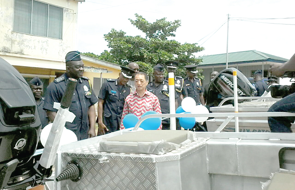 The IGP, Mr David Asante-Apeatu (left), the Japanese Ambassador to Ghana, Mr Tsutomu Himeno, and other senior officers of the Ghana Police Service inspecting the boats after the hand-over ceremony. INSET: The two patrol boats. The IGP, Mr David Asante-Apeatu (left), the Japanese Ambassador to Ghana, Mr Tsutomu Himeno, and other senior officers of the Ghana Police Service inspecting the boats after the hand-over ceremony. INSET: The two patrol boats.