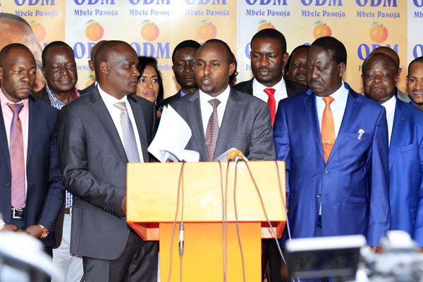 ODM's National Assembly Minority Whip Junet Mohamed, flanked by other members, addresses journalists at Orange House, Nairobi, on March 13, 2018. The ODM members have promised to work with Jubilee Party. ODM's National Assembly Minority Whip Junet Mohamed, flanked by other members, addresses journalists at Orange House, Nairobi, on March 13, 2018. The ODM members have promised to work with Jubilee Party.